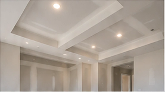 Residential ceiling with clean detailing and recessed lighting